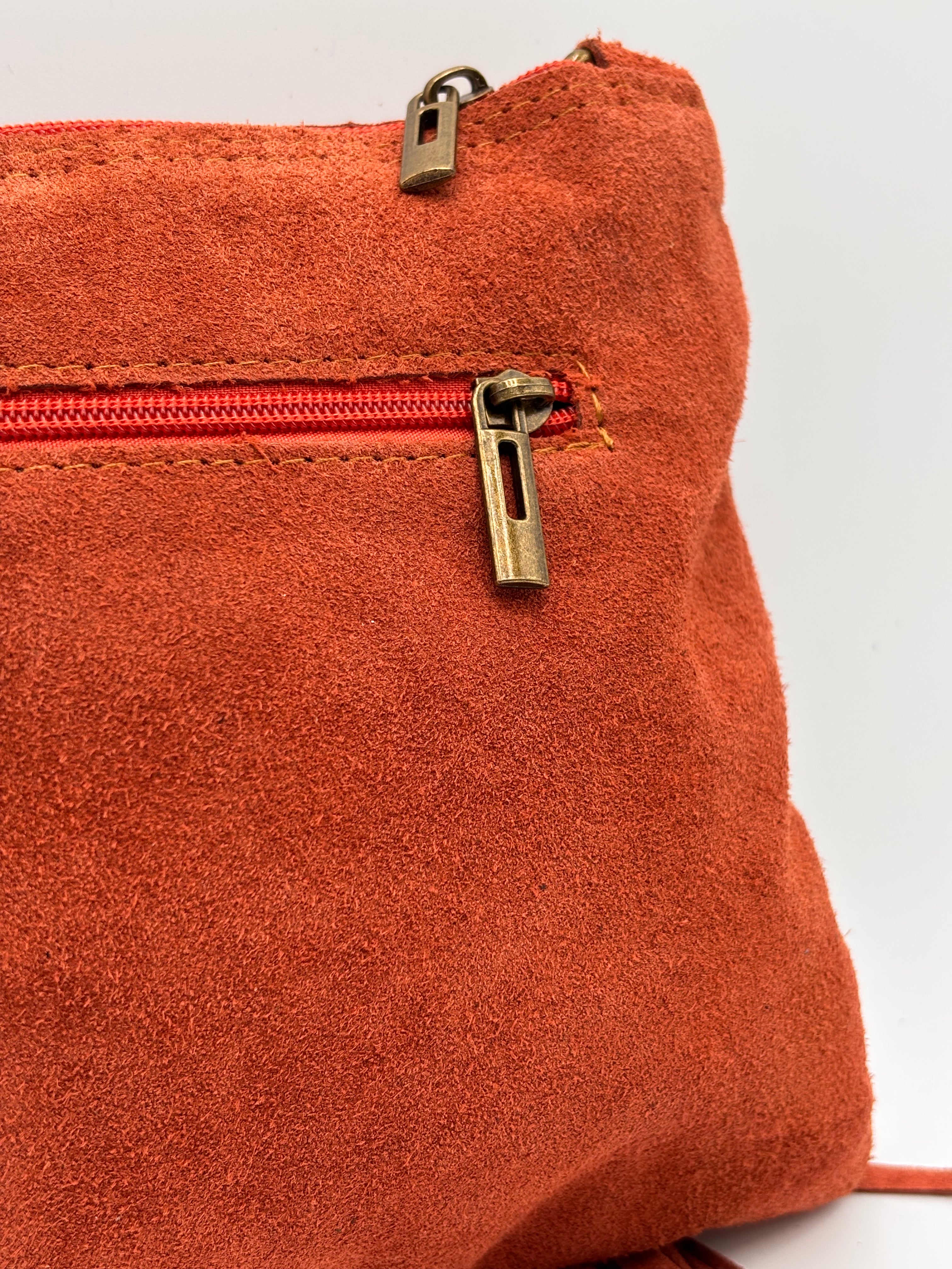 Mala/Clutch em camurça Telha