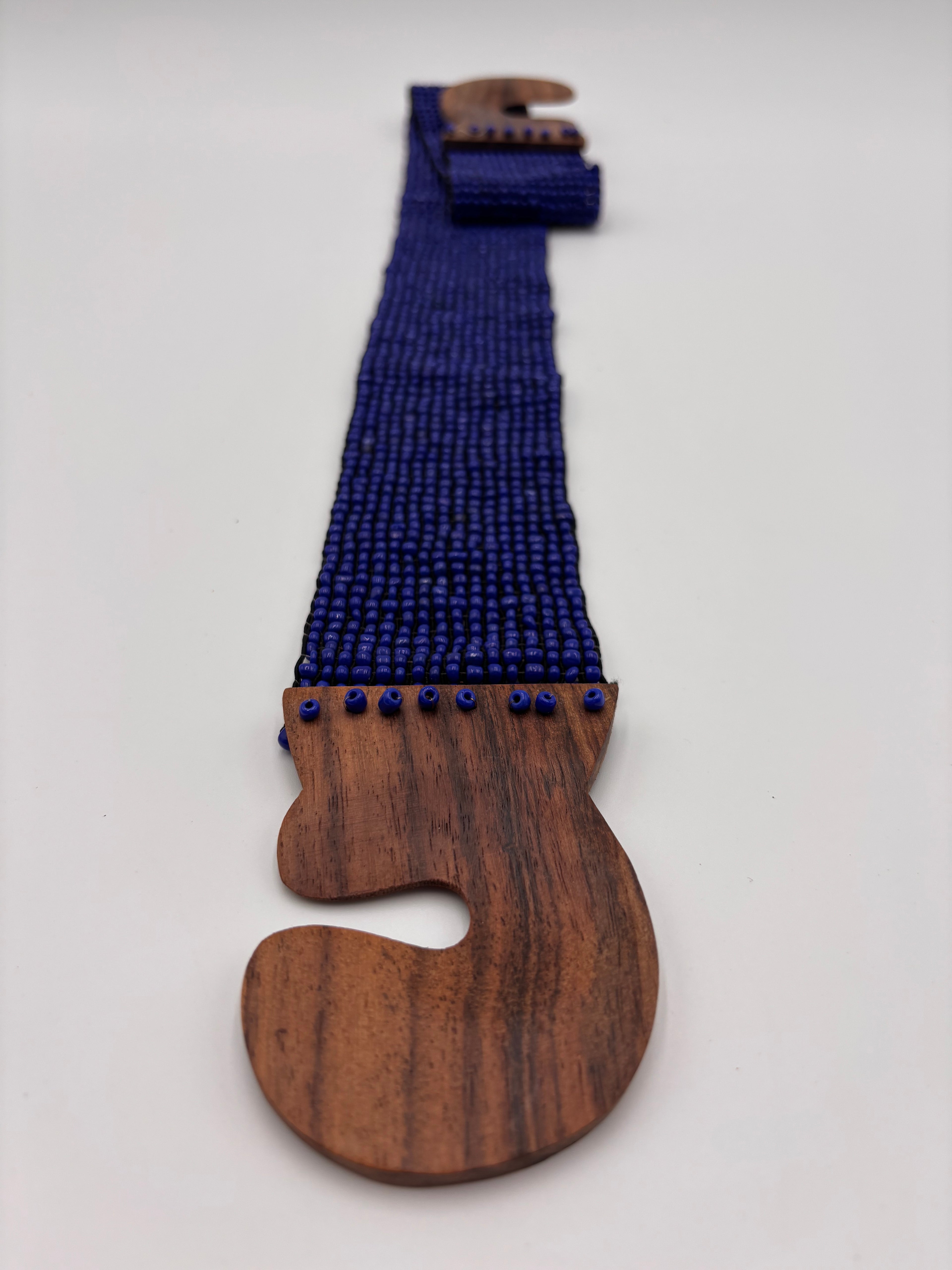 Cinto elástico com contas azul